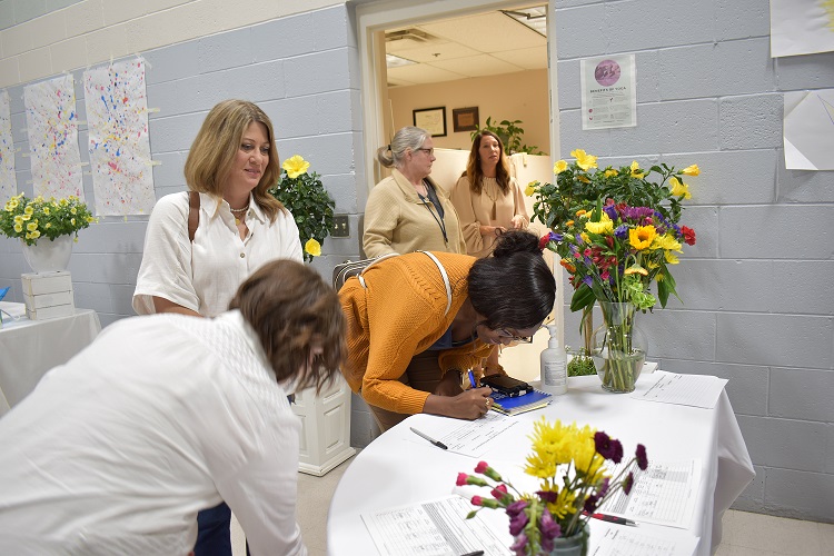 Photo of guests signing in at Bridging the Gap
